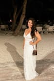 I wore this both on my batch for our fancy night and for our dinner rehearsal. I love this dress and want to wear it a million times more. The straps can be confusing so have a friend help you get situated. - Caitlin L.