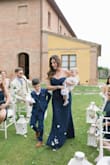 I got this dress for my daughters wedding and it worked great. It looked elegant. It fit well with no alterations needed. The top wiggled a little bit I am not big chested. It fit true to size - Tina M.