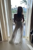 The dress was long for me so  I cut the bottom myself and it still looked perfect! I wore it to my beach wedding and got a million compliments. - Teresa M.