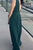 I was a bridesmaid for my friend's wedding and this dress was absolutely perfect. It is super flattering and comfortable and true to the color on the website. I am petite, so I had to hem, but other than that it was perfect. I'd also recommend fabric tape to make sure you don't flash when you're moving around, I did this and was totally fine. I got compliments all night and will definitely keep the dress for any formal events in the future. - Ang S.