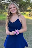 I wore this to a homecoming dance and it was very flattering and looked great. I was a little disappointed on how cheap the straps were and how the material looked. Looking from far away it was great. - Mia L.