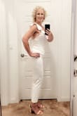 Hugs curves in all the right ways. Has some stretch so it makes this outfit extremely comfortable. Size Medium. - Allison D.