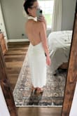 I was really torn between the S and XS. I'm so glad I ordered both sizes. The S fit nicely in my hips but ultimately had too much gapping/extra fabric on top. I would've needed a lot of fashion tape to feel secure. You could argue the XS is a BIT snug in the hips, but it fits perfectly on top. I have wider hips, so this is often a struggle for me (especially with unforgiving fabrics). Despite that, I have no issues sitting down and it doesn't ride up. I absolutely love it, and can't wait to wear it to my bridal shower! (And honestly, would wear this again on vacation or to a nice dinner! It's so comfortable!) - Lauren G.
