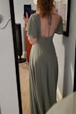 I bought this dress for an outdoor summer wedding and couldn't be happier with it! The material is thick but breezy - it's not at all see through but will breathe beautifully. The waist ran a bit big (I'll be getting it taken in by an inch or two) but even if I didn't, it'd still fit very nicely. 

I absolutely adore the color, really true to what is shown online. - Katie C.