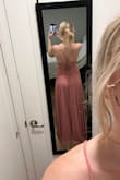This dress makes me feel like a princess! It is so beautiful. The only thing is that it is a little long (even with heels.) I will need to have it altered a bit. You are able to adjust it a bit with the strings which is nice. - Jessica M.