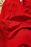 Dress arrived with a hole/stain on the front. Really noticeable. It was the first thing I saw.
On a size note, it's not meant for shorter torsos. The sides pucker but it fits everywhere else. - Danielle M.