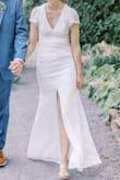 I wore this for our wedding and it was perfect. Such soft and stretchy lace making it comfortable and cool yet fancy. I liked the symmetrical slit rather than on one leg, and it never felt "too high" of a slit. Loved it. - Jillian S.