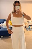 The top fit a little too tight but I'm making it work. I'm very bustie so I understand. If I would've gotten the L size it would've been way too loose on the bottom. So I'm happy with it. - Fiorella L.