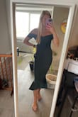 Material is a little stiff but this is a super cute dress. A little big in the hip area but it's really flattering otherwise. I might wear this to a wedding - Emma M.