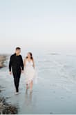 I bought this dress for my beach wedding and it was perfect! The only alterations I needed was to get it shortened a little bit but the rest fit perfectly! I was very surprised with how beautiful my dress was considering it was under $100. I got so many compliments too! The best part was that I am only going to wear it one day and since we were on the beach I didn't want a fancy expensive dress to have a chance of getting ruined. I'd highly recommend! - Rachel B.