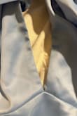 I purchased this dress for a wedding and it almost immediately started ripping at the seam in the center of the bust. All night it ripped further and further down until it could not rip anymore. It completely exposed my chest, and I constantly had people telling me that my dress was ripping. This is not the first time this has happened to me with a dress from Lulus. It is a beautiful dress, but I am repeatedly disappointed at the quality. My dress was LITERALLY ripping at the seams. I also am a frequent Lulus buyer and always purchase the same size, it was not too small or too tight. As pictured in the photos, a majority of that center chest area is not supposed to be open/exposed as it is. - Melanie K.