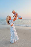 Love this dress! The colors and flowiness are perfect for a beach vacation and beach photoshoot! Took some family photos in it and it looks beautiful! Would definitely recommend! Needed to wear nipple covers, as it is low cut. It was also a little long on me, but I really liked the length! - Shelby A.