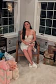 Bought this dress for my bridal shower and loved it. It fits true to size and had a little stretch to it. However, as so many other reviews said, I had the same problem with the lining hanging out of the slit. Which, is annoying but at least I was prepared. It took my friend and I about 30 minutes and some iron-on hem tape to get it right but after that, you couldn't even tell. - Christina K.