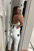 I bought this for my courthouse wedding and even though I went with another dress from Lulu's, it was a top contender. It fit me but it was made for standing, not sitting. The top doesn't stay up well and the bow is super difficult to put on (it snaps onto the back of the romper). It was a good runner up-might fit better with bigger boobs, smaller waist and smaller thighs - Devyn B.