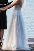 Alright ladies interested in this dress - I gotchu!
Backstory: I was eloping on a budget. I was nervous about this dress because I couldn't order custom sizing like the other dress from a different company I was interested in. But this was the best dress I could find that was inexpensive but still bridal so I took the risk and got it.
My thoughts: it's great for a budget. The length was honestly just barely passable with my short height. I bought an underskirt to help and I had small heels. Those combined were just enough to make it not drag badly. But learn from my mistake and don't buy an underskirt with just the one wire at the bottom. It shows. Ruined some of my photos, imo.
Honestly I hate the back of this dress. But my hair and veil covered a majority of it so it was fine. And having the adjustable back is the only reason the dress even fit in the torso. so, give and take. Finding a bra was awful.
Notice my photo that shows how there are 3 layers to the skirt, I couldn't tell from this listing. - Samantha I.