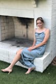 This dress fit me beautifully and was wonderful for a summer wedding! The fabric is high quality, the straps are adjustable, and the slit in the front is an appropriate length for a wedding guest dress. This was a my first "grown up" dress and I could not be happier - Emily B.