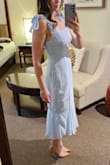Purchased to match my daughter's periwinkle swiss dot dress for a wedding. So many positive comments. Took a 2nd dress just in case after reading the reviews however had no issues. The dress was perfect just a bit big. Typically a size AU8 and ordered size small. - Verity R.