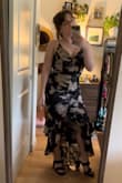I purchased a few dresses as options for a wedding I am going to in early fall. This fit my body perfectly, and the ruffles/hi-lo detail really worked well without being overwhelming since I'm on the more petite side. - Catherine B.