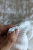 I loved this shirt but wore it once and the V-shaped wire started poking out on one side. I thought I would wash it and then try to stitch it closed before wearing it again. Nope, the whole piece somehow came out through the tiny hole in the wash. (Washed on delicate and did not dry.) I'm not even sure how that even happened but without the wire to give it structure the neckline droops and makes the shirt unwearable. Pretty unfortunate considering the price. - Faith E.