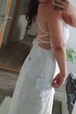 I bought it for my wedding at the end of July. It came super fast, it fits perfect. I am glad I went with a size M. It is sparkly, has 3 layers, and adjustable straps. - Zsófia P.