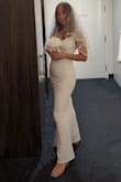 This dress fit me perfectly. Enhanced my curves and showed some cleavage, but not too much. Beautiful dress. - Alyssa W.
