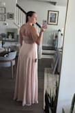 Was super excited when I order this dress, but it showed up two toned. Really wish the bodice and skirt matched. Fit was nice though. - Nicole U.