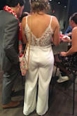 I got this jumpsuit for my wedding's after party. IT WAS PERFECT! I got so many compliments on it (more than my dress!) I wore 3" heels with it and it fit perfectly on the ground. I normally order a medium but I felt like a large was better since I wasn't sure if I would bloat from the dinner and drinks and the after party. I plan on keeping this jumpsuit and wearing it for anniversaries in the future! - Nikki F.