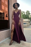 I love this jumpsuit. I wore it for my birthday dinner. The color, the fabric, and the fit were great. Super comfortable. I would've loved if the seam at the waist was a little lower because my legs are already so long, but it fit well and I felt amazing in it. - SyKnese F.