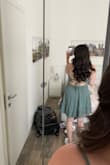 I have worn this so many times already, even took it with me on two summer trips. However, I've only washed it twice and it already has a small hole in the seam on the left side of the bust. I can sew it, but it's a little disappointing. - Sarah G.