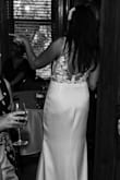 We planned an entire wedding in very little time due to changing our original plan to elope. I wanted a simple dress that was classy and timeless and this was perfect! I am very petite on top and fuller on the bottom (small boobs, little belly, and a big butt) and the medium was just right. I could have had it taken in a tiny bit at the shoulder straps for a little bit of a better fit, but I didn't have time. With a padded stick-on silicone bra, it did the trick and filled out the top nicely. My day was perfect and the dress was everything I hoped it would be! My husband loved it, too! - Leah K.