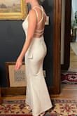 This dress was beautiful and I felt gorgeous and sexy in it. It's more flattering than I imagined it would be. I seriously was considering this as my wedding dress but ultimately want a dress that is a little more timeless. If I didn't have that as my ideal, I easily would have said yes to this dress! - Anya W.