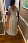 I wanted to love this dress so badly! The top was a little big and the sleeves were attached to the trunk in a weird way that didn't fit well. The bottom was a little small, but really good quality and would have been comfortable if it fit. - Caitlin N.