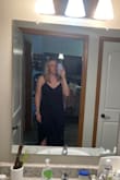 I originally ordered this in a large & the fabric has no stretch. I exchanged for an XL & it fits great! There's a small gap under the armpits but I can hide that. It is a staticky material but with spanx on underneath you can't feel it! - Lauren G.