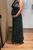 This is the second color I have purchased of this dress. I got the green one for a military ball in a size Medium while being 25 weeks pregnant. With the return policy I had to try to get it a month it advance and it fit with breathing room when it was delivered and just barely zipped the night of (growing belly problems). Even with this it was still perfect and made me feel pretty. I also got a Large but it was too big in the chest and waist area at the time and not sure it would have fit any better a month later. 5'6 and Worn with 1 inch heels (also sewed the straps together to have better support in the chest area but that was just for comfort) - Katie E.