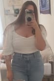 If youre a bigger busted girlie like me SIZE UP!! I am normally a medium in tops but had to exchange for a large because it was SO tight on me I couldnt breathe. the large fits much better, only downside is the sleeves are just a tad too big and slide down easily. - Jade A.