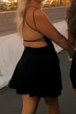 This was such a fun dress to wear in Vegas! I love the skater style. I wore black bikers under and some Nikes.
Didn't wear a bra and the material was thick enough to be just fine. - Tia M.