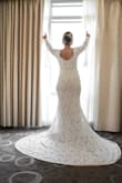 The wedding industrial complex almost got me and I really almost spent hundreds (because I just couldn't do thousands) on a dress and I'm so grateful I didn't. I LOVED this dress. I had the slit sewn shut and the waist taken in at the tailor and I felt like I was marrying a matador in the late 1800s. It was such a beautiful, unique floral lace pattern that matched my gold floral accessories. The bell sleeves were so fun and the fit was so flattering. I am a sweaty person and I was worried about the polyester material but it was honestly so breathable and I was surprised at how comfortable I felt. My guests loved the vintage look and were so surprised that it was something I had gotten online for this price. 10/10, 5 stars, definitely recommend! - Ana P.