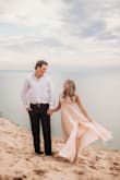 OBSESSED with this dress! I wore this for our engagement shoot and felt so sexy! I'm only 5 feet, so had to get it hemmed slightly and altered a little in the bust (it's made for bigger chests) but absolutely loved it. Would definitely recommend, but will need alterations if you're petite! - Lauren C.
