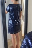 I bought this as an option for the Eras tour, but it wasn't flattering. It looked like a sequined nightgown. It was very flowy and was comfortable and not scratchy, but I didn't like how it looked. - Jane E.