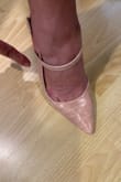 Beautiful nude color. Looks very elegant and dressy. The straps dont lay flat and the shoe runs large. I dont like the space behind my heel - Khahnie P.