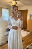I ordered this dress for my wedding and I fell in love with it as soon as I tried it on. It is so sweet and simple, it gives the perfect mixture between elegance and class. Only complaint is that is was a little long on me and I didn't have time to get it altered& other than that it was perfect and exactly what I was looking for. - Jill P.