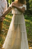 I ordered this dress to wear for my engagement photos on my fiance's pontoon. It is incredibly well made - thick and layered material. It is a bit sheer, so make sure you wear nude undergarments. - Stacie P.