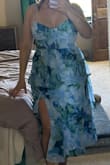 This dress fit great and was exactly as pictured! I wish it was a little shorter, it fell right above my ankles but I am fairly short. I don't think it would be a good dress for someone with a large chest though. - Shireena P.