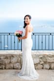 I wore this gown for my elopement ceremony and it was absolutely stunning. Fits wells and hugs every curve. - Katherine S.