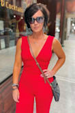 Talk about a head-turner! This color of red on this jumpsuit is so stunning and gets a lot of attention.  The jumpsuit has some stretch and is sexy.  The material is great quality with a sturdy back zipper.  I love it! - Michelle T.