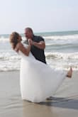 The dress was prefect for my beach elopement. I was looking for a dress that would flow in the wind and that wasn't too fancy. I wear a 10 or size medium but ordered a large in this dress based on reviews. It was a little bit big but worked out ok. The fabric was nice and I liked the simplicity of the style. - Laurel V.