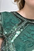 This dress is amazing. The bead work and embroidery is so beautiful and such great quality. The sizing guide was perfect as this fits me like a glove. The dress is also very comfortable and overall just amazing quality! - Natalie H.