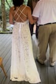 I ordered a total of 7 Lulus dresses for my elopement. First batch of 4, I narrowed down to 2 but wasn't 100% sure they fit the location. Ordered/received 3 more with 2 days before I left for the trip and saved this one for the last that I tried on. I immediately knew this was the one! It is the most ME, fit was perfect and seemed to also fit the occasion/location perfectly, no question. Front was perfect, back was perfect, length was doable. I 100% recommend this dress! I've gotten sooo many compliments on it and am thinking where could I possibly wear it again to, lol. I wish I could add more than 2 photos! Oh and FYI-this dress has a bodysuit, snap crotch and the rest (bottom) is unlined, see through lace and a very high split. I'm fine with it but maybe a deterrent for others not aware. Also, I added bridal belt for some bling!
Thank you Lulus for my perfect dress!! - Carolynn P.