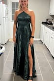 This dress is so beautiful. And the color and material is so elegant. It's double-layered on the bottom for more volume. The slit is perfect and the top is so flattering. Fit just right - McKenzie M.