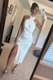 A beautiful classic elegant dress for any wedding event. The dress was very flattering. I love the open back, and the slit was the perfect amount of lake. I would suggest getting the dress dry clean for your event. - Alexandria V.